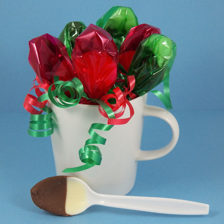Fancy chocolate spoons in a mug.