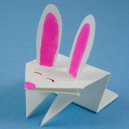 Jumping origami bunny decorated with markers