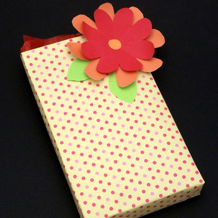 Decorate gifts with paper flowers
