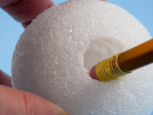 Make a hole in the foam ball for your finger