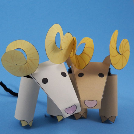 Two bighorn sheep finger puppets