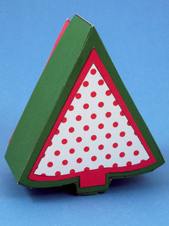Tree shaped box with two colors of inset decorations