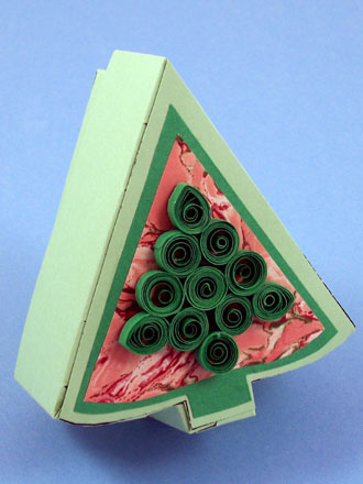 Tree box decorated with marbled paper and quilling