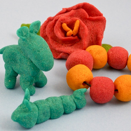Modeling dough: flower, beads, animals