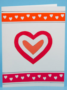 Cut and layered paper heart Valentine's Day card
