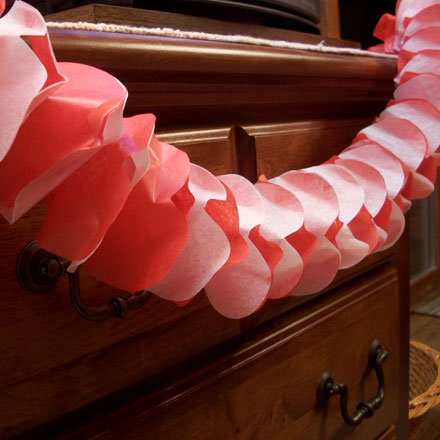 Valentine garland draped on a chest of drawers
