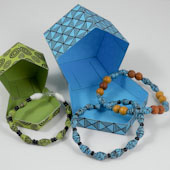 Shiny paper beads made into bracelets