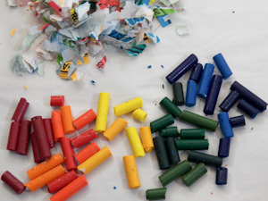 Peel paper off crayons and sort by color