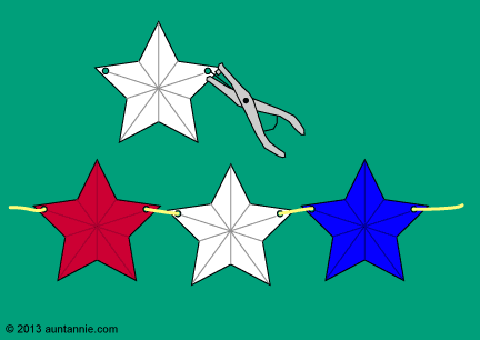 Punch holes in the stars and string them on a length of yarn