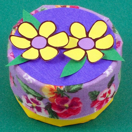 Trinket box decorated with flower cutouts