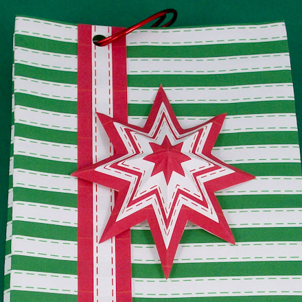Striped bag decorated with green and red medallion