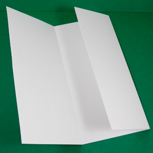 Fold card stock on scored lines