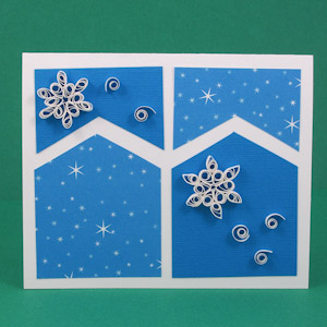 Winter-themed card with snowflake quilling
