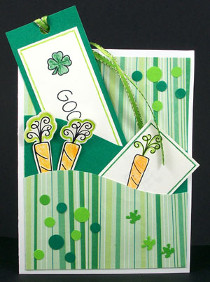 Decorated card with bookmark, little card and stamped carrots in the pockets