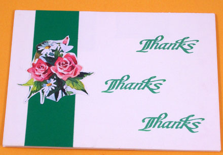 Card decorated with fussy-cut rose, green border and thanks stamped 3 times