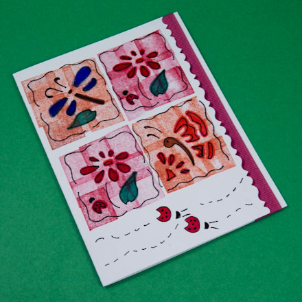 Sample ribbon edge card in reds and oranges