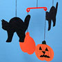Halloween mobile with cats and pumpkins