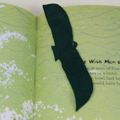 Eagle bookmark made of dark green suede