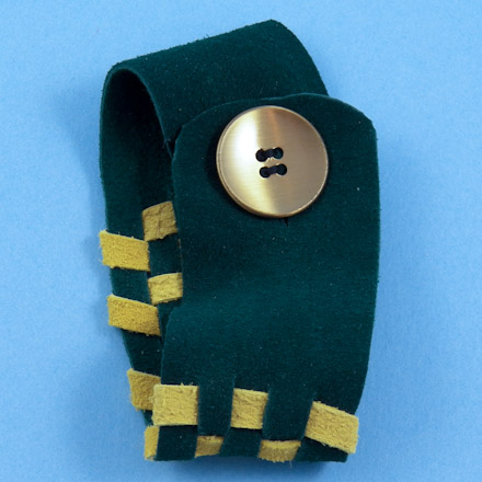 Suede bracelet with button closure