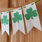 St. Patrick's Day banner with shamrock cutouts
