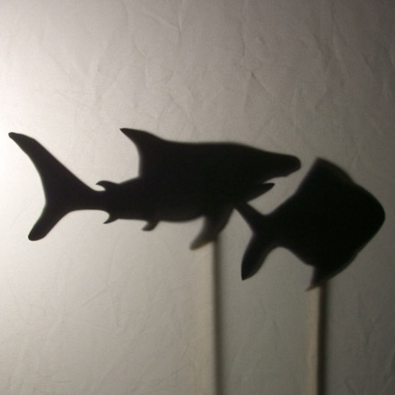 Shark and fish shadow puppets
