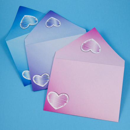 Three colorful envelopes with standard flaps
