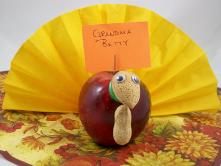 Turkey place card made using an apple and a napkin