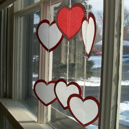 Valentine suncatchers hanging in window